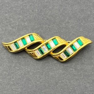 Swarovski green and clear crystal gold tone S.A.L. Brooch. 2 1/8 x 1/2 inches